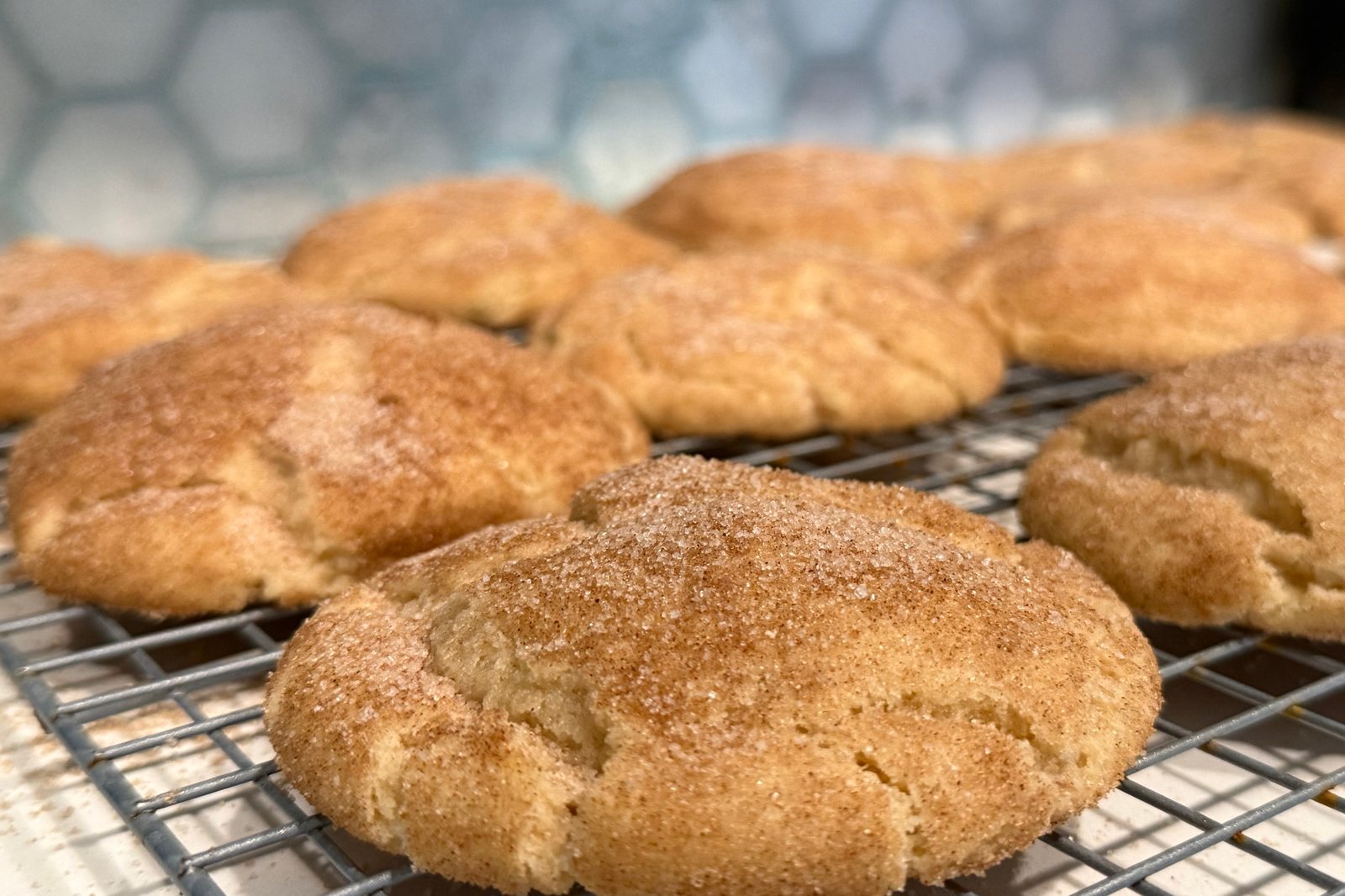 Three Sisters Vegan Snickerdoodles, soft and crackled with cinnamon sugar, cooling on a wire rack